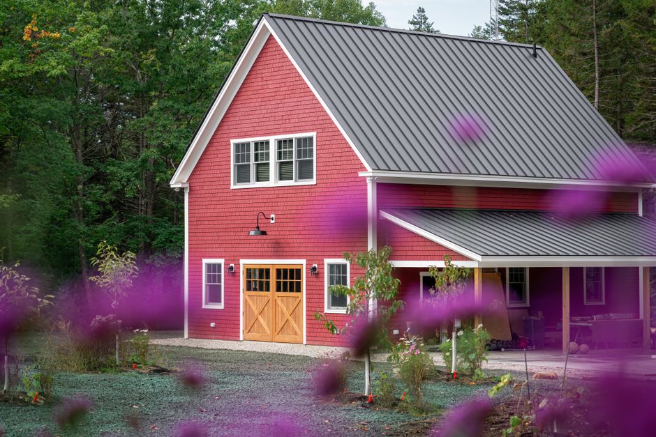 Barn-style home with a metal roof, an example of a metal building home with living quarters in Virginia